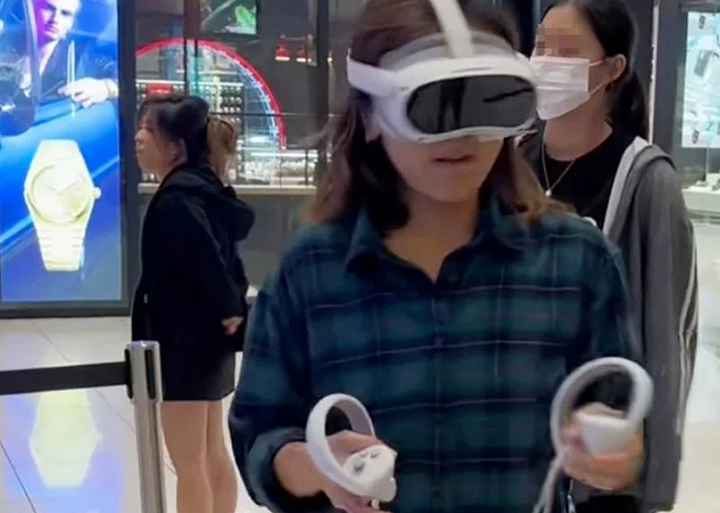 Woman smashes television after she got too excited from playing Virtual Reality boxing game