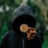 Jamie Dimon Is Bullish On Blockchain, But Says Bitcoin Is A 'Hyped-Up Fraud' — And Satoshi Nakamoto Might Be Waiting To 'Laugh At You All'  - Benzinga